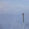 Nedsnødde gjerder er en utfordring vinterstid. Foto: Aron Freyr Gudmundsson